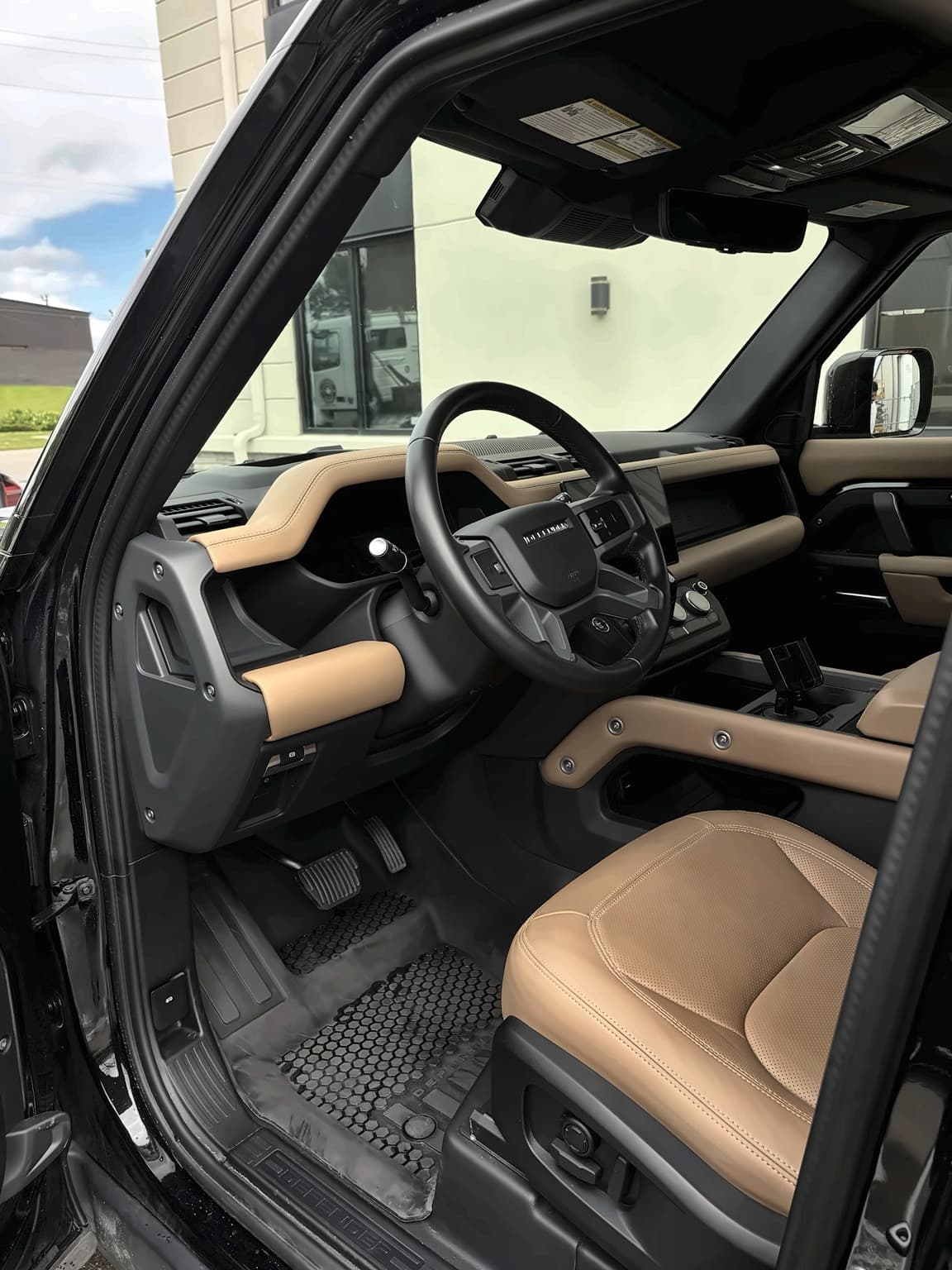 Land Rover Defender driver-side interior after a complete detail